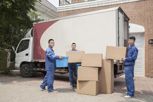 Furniture removals team handling heavy household items in Harringay
