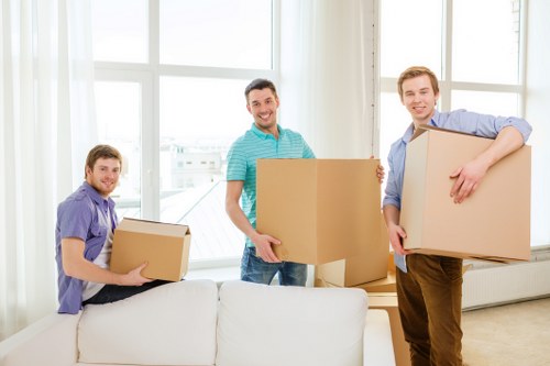 Packed boxes and furniture arranged for safe removal services in Harringay