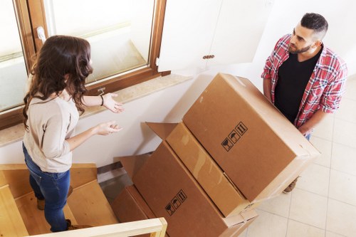 Boxes and furniture arranged for a smooth house removal in Harringay