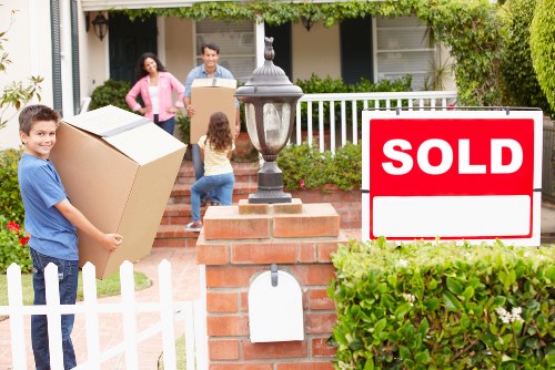 Trained movers handling furniture with care in Harringay